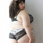 Moet Cristal is a plus size model modeling plus size lingerie