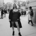 Plus size model Sarah Hamel-Smith aka TheCurvyTrini modeling a plus size dress